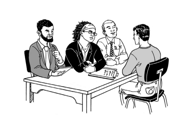 Man sitting across from three board members.